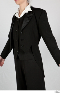  Photos Woman in Historical Dress 39 20th century Historical clothing black historical suit black suit upper body 0002.jpg